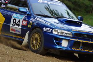 Piotr Fetela / Ray Vambuts in their Subaru Impreza STi on SS7