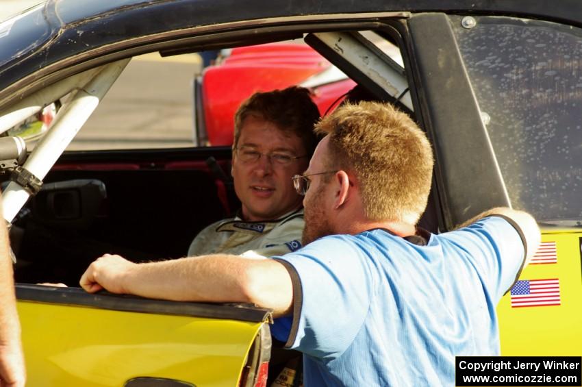 Chris Greenhouse and Matt Bushore converse before the start of day two