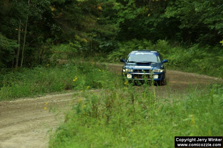 Piotr Fetela / Ray Vambuts in their Subaru Impreza STi on SS7