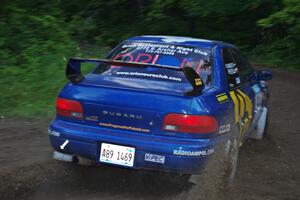 Piotr Fetela / Ray Vambuts in their Subaru Impreza STi on SS9