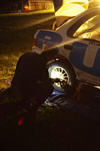 Al Kaumeheiwa works on the Henry Krolikowski / Cindy Krolikowski Subaru WRX at service.