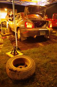 A blown tire from the Anthony Israelson / Jason Standage Subaru Impreza lays on the ground at service.