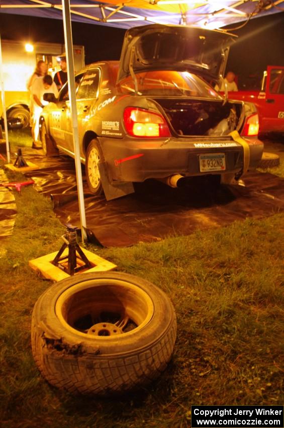 A blown tire from the Anthony Israelson / Jason Standage Subaru Impreza lays on the ground at service.