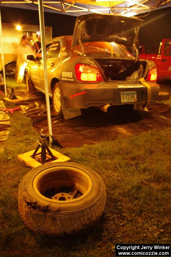 A blown tire from the Anthony Israelson / Jason Standage Subaru Impreza lays on the ground at service.