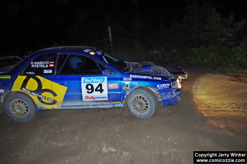 Piotr Fetela / Ray Vambuts in their Subaru Impreza STi on SS10.