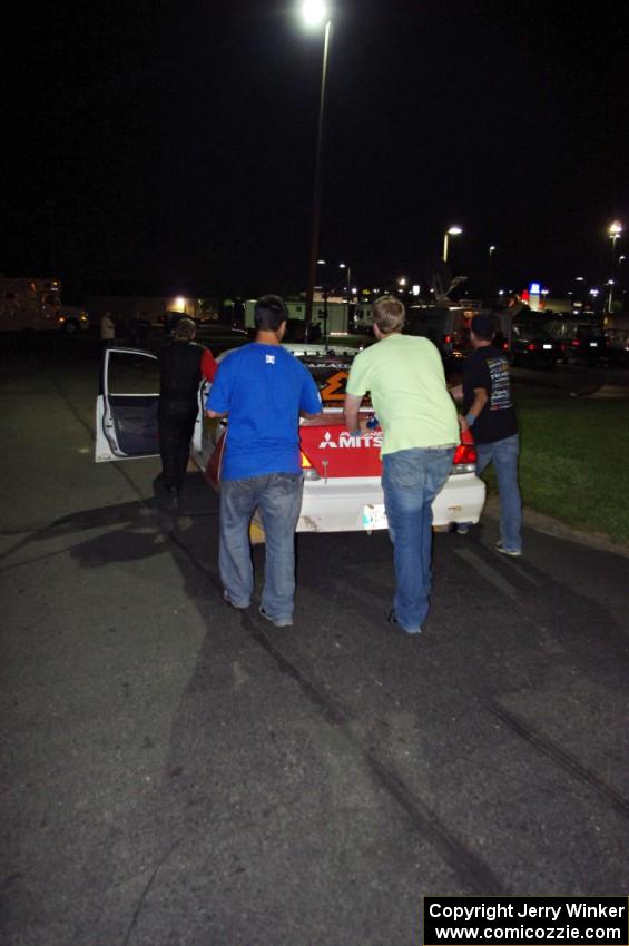 Engine blown, the Jan Zedril / Jody Zedril Mitsubishi Lancer ES 4B11 is pushed away from the final MTC.