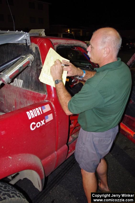 Dave Fuss checks the Jim Cox / Dan Drury Chevy S-10 into the final MTC.