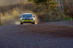 Chris Greenhouse / Brian Johnson in their Plymouth Neon on the practice stage