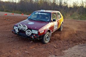 Sean Murphy / Ken Tsang VW GTI at a hairpin on the practice stage