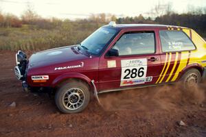 Sean Murphy / Ken Tsang VW GTI at a hairpin on the practice stage