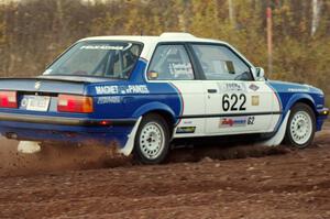 Scott Sanford / Joel Sanford in their BMW 325i on the practice stage