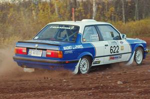 Scott Sanford / Joel Sanford in their BMW 325i on the practice stage