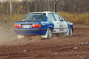 Scott Sanford / Joel Sanford in their BMW 325i on the practice stage