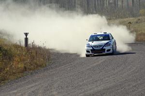 Eric Burmeister / Dave Shindle in their Mazda MAZDASPEED 3 on SS1 (Green Acres I)