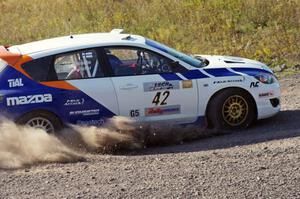 Eric Burmeister / Dave Shindle in their Mazda MAZDASPEED 3 on SS1 (Green Acres I)