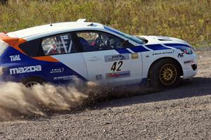 Eric Burmeister / Dave Shindle in their Mazda MAZDASPEED 3 on SS1 (Green Acres I)