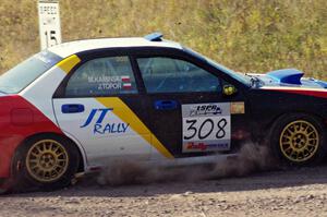 Janusz Topor / Michal Kaminski in their Subaru WRX STi on SS1 (Green Acres I)