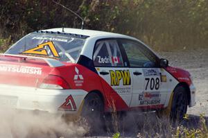 Jan Zedril / Jody Zedril in their Mitsubishi Lancer ES on SS1 (Green Acres I)