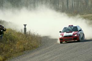 Scott Crouch / Rebecca Greek in their Subaru WRX on SS1 (Green Acres I)