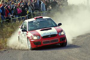 Scott Crouch / Rebecca Greek in their Subaru WRX on SS1 (Green Acres I)