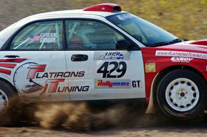 Scott Crouch / Rebecca Greek in their Subaru WRX on SS1 (Green Acres I)