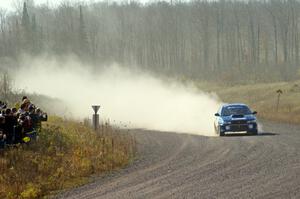 Piotr Fetela / Ray Vambuts in their Subaru Impreza STi on SS1 (Green Acres I)