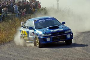 Piotr Fetela / Ray Vambuts in their Subaru Impreza STi on SS1 (Green Acres I)