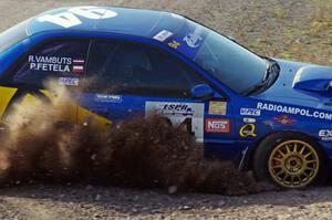 Piotr Fetela / Ray Vambuts in their Subaru Impreza STi on SS1 (Green Acres I)