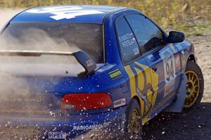 Piotr Fetela / Ray Vambuts in their Subaru Impreza STi on SS1 (Green Acres I)