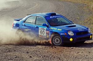 Dick Rockrohr / Dan Rockrohr in their Subaru WRX on SS1 (Green Acres I)