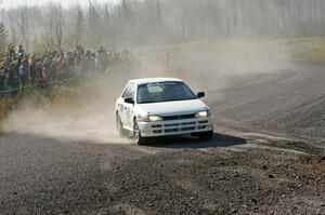 Andrew Hyde / Tyler Bell in their Subaru Impreza on SS1 (Green Acres I)