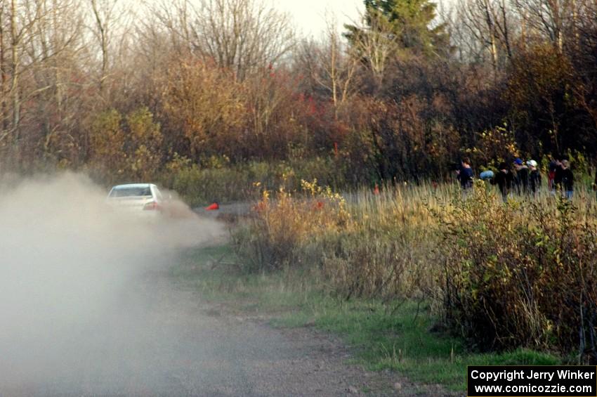 Yurek Cienkosz / Mariusz Malik in their Subaru WRX on the practice stage