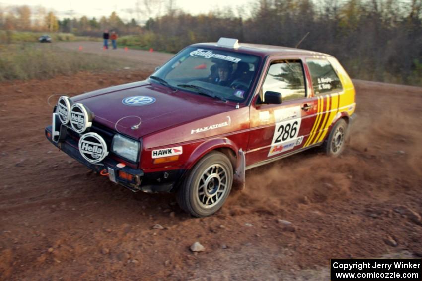 Sean Murphy / Ken Tsang VW GTI at a hairpin on the practice stage