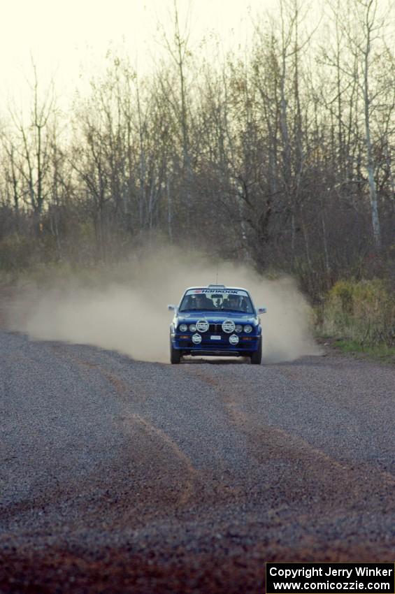 Scott Sanford / Joel Sanford in their BMW 325i on the practice stage