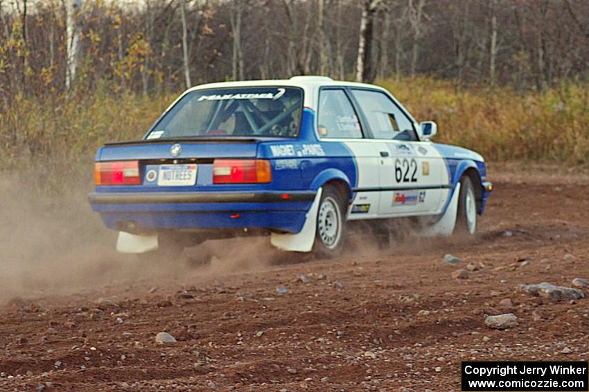 Scott Sanford / Joel Sanford in their BMW 325i on the practice stage