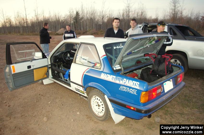 Scott Sanford / Joel Sanford in their BMW 325i after the practice stage