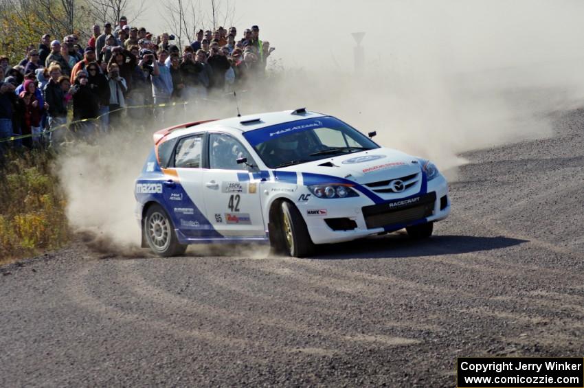 Eric Burmeister / Dave Shindle in their Mazda MAZDASPEED 3 on SS1 (Green Acres I)