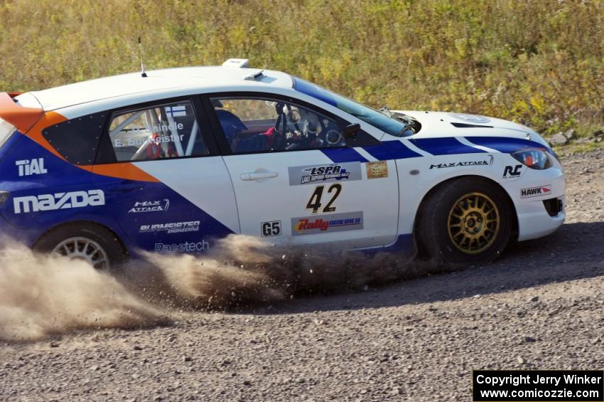 Eric Burmeister / Dave Shindle in their Mazda MAZDASPEED 3 on SS1 (Green Acres I)