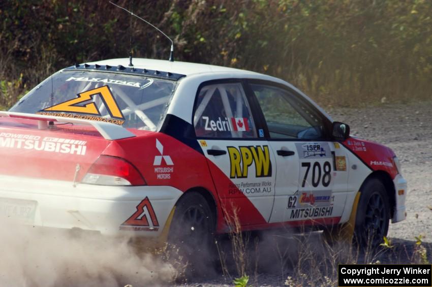 Jan Zedril / Jody Zedril in their Mitsubishi Lancer ES on SS1 (Green Acres I)