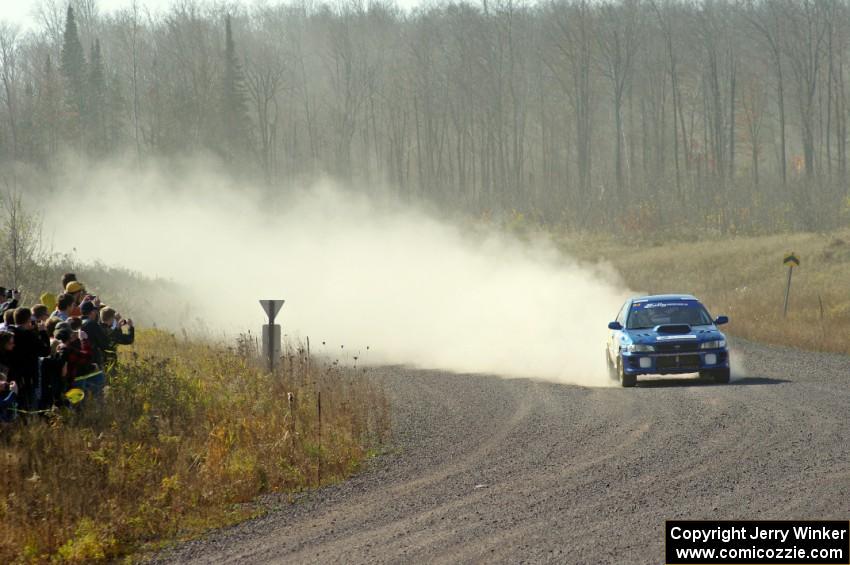 Piotr Fetela / Ray Vambuts in their Subaru Impreza STi on SS1 (Green Acres I)