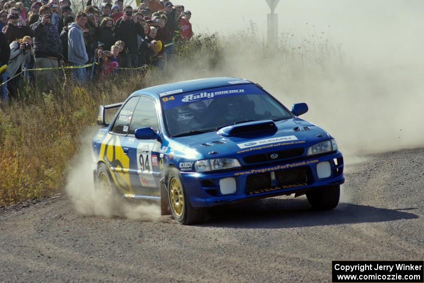 Piotr Fetela / Ray Vambuts in their Subaru Impreza STi on SS1 (Green Acres I)