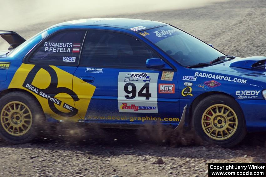 Piotr Fetela / Ray Vambuts in their Subaru Impreza STi on SS1 (Green Acres I)