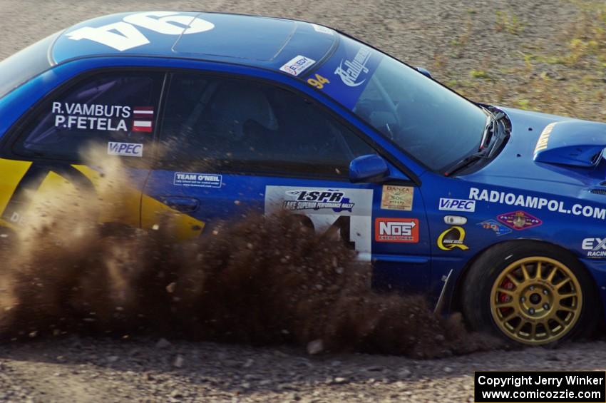 Piotr Fetela / Ray Vambuts in their Subaru Impreza STi on SS1 (Green Acres I)