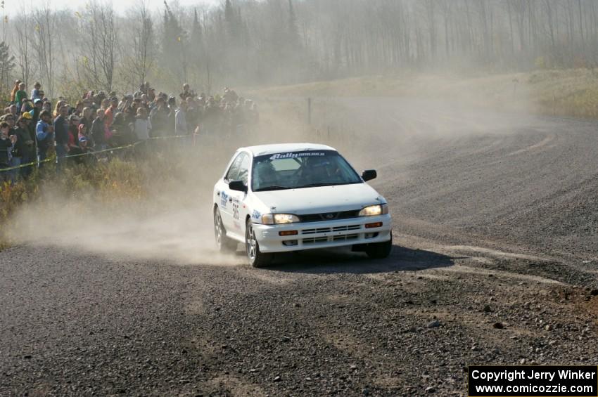 Andrew Hyde / Tyler Bell in their Subaru Impreza on SS1 (Green Acres I)
