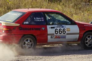 Paul Donlin / Billy Mann in their Ford Escort on SS1 (Green Acres I)