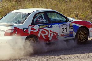 Yurek Cienkosz / Mariusz Malik in their Subaru WRX on SS1 (Green Acres I)
