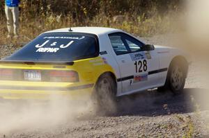 Mychal Summers / Ryan DesLaurier in their Mazda RX-7 on SS1 (Green Acres I)