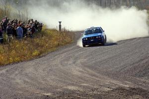 Scott Sanford / Joel Sanford in their BMW 325i on SS1 (Green Acres I)