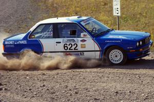 Scott Sanford / Joel Sanford in their BMW 325i on SS1 (Green Acres I)