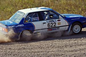 Scott Sanford / Joel Sanford in their BMW 325i on SS1 (Green Acres I)